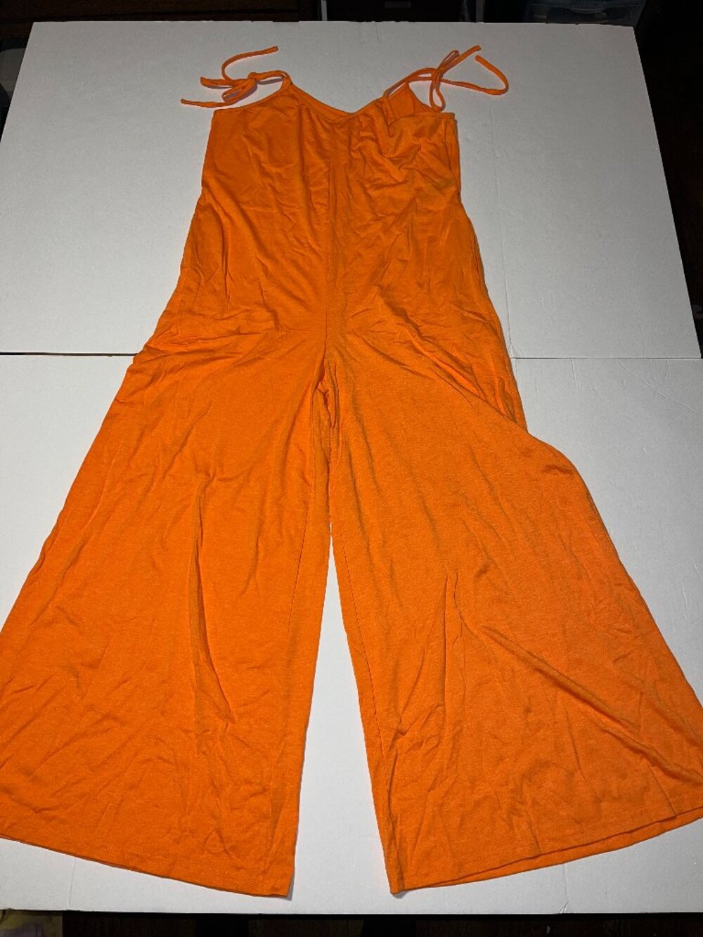 Emery Rose women's orange flowy jumpsuit size small NWOT